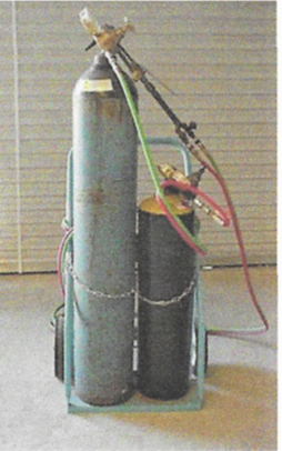 Cylinder toppling while being moved with a hand truck