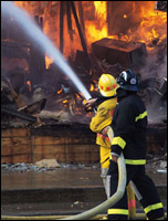 Firemen Working on Fire
