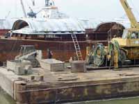 Figure 5: Barge with work barge along side.