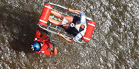 Photo courtesy of the U.S. Coast Guard. This picture shows actual disaster site work conditions and may not illustrate proper safety and health procedures.