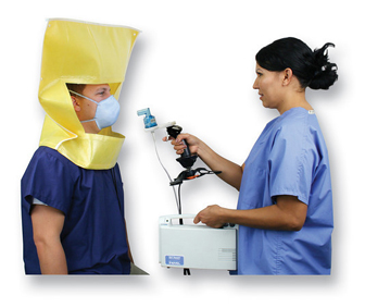 Healthcare worker using respirator on patient